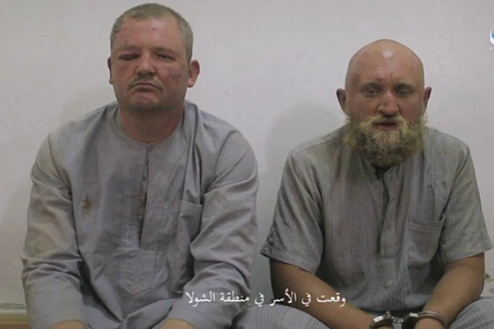 О пленении Заболотнего (справа) и Цуркану стало известно из опубликованного в Сети видеоролика. Фото: скрин с записи.