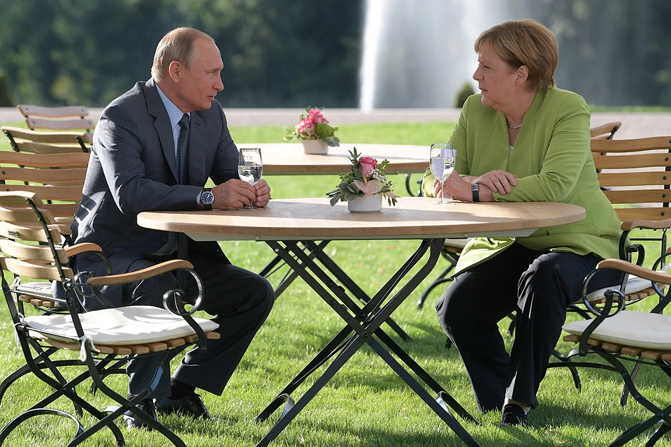 Владимир Путин и Ангела Меркель во время переговоров 19 августа 2018 г.