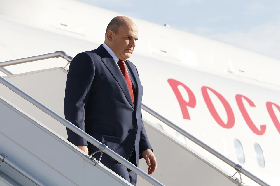 Премьер-министр РФ Михаил Мишустин после прилета в аэропорту Минска. Фото: Дмитрий Астахов/POOL/ТАСС