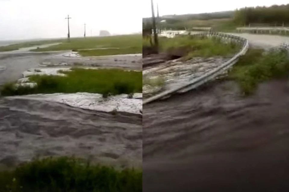 Вода с полей превратилась в настоящий ручей, бегущий в сторону проезжей части. Фото: кадр из видео
