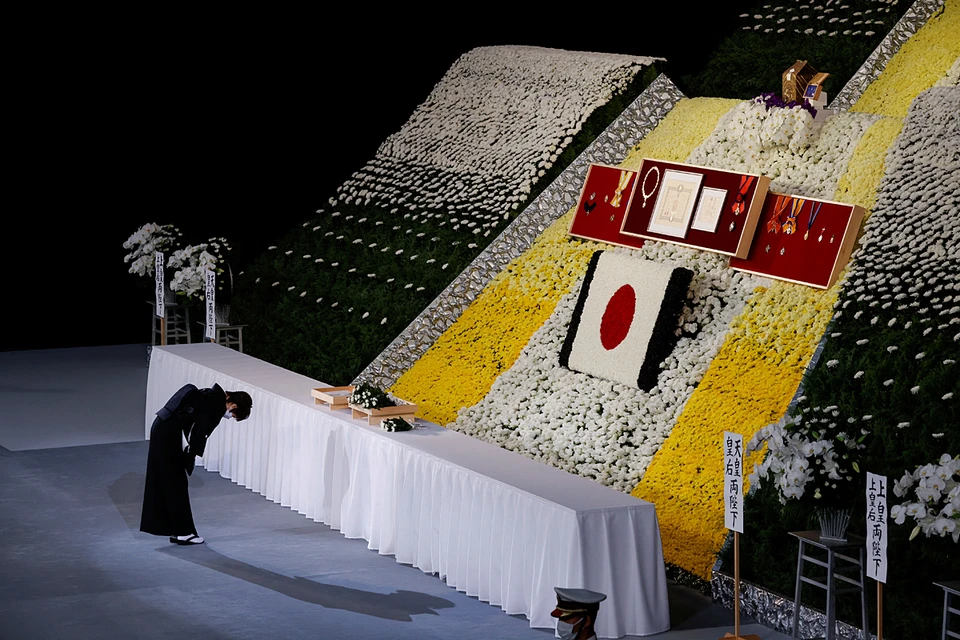The state funeral ceremony in Japan is not like a traditional funeral rite, but rather a solemn 