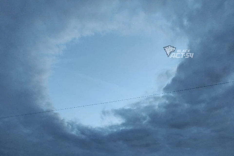 Портал заметили в небе над Новосибирском утром 19 сентября. Фото: "АСТ-54".