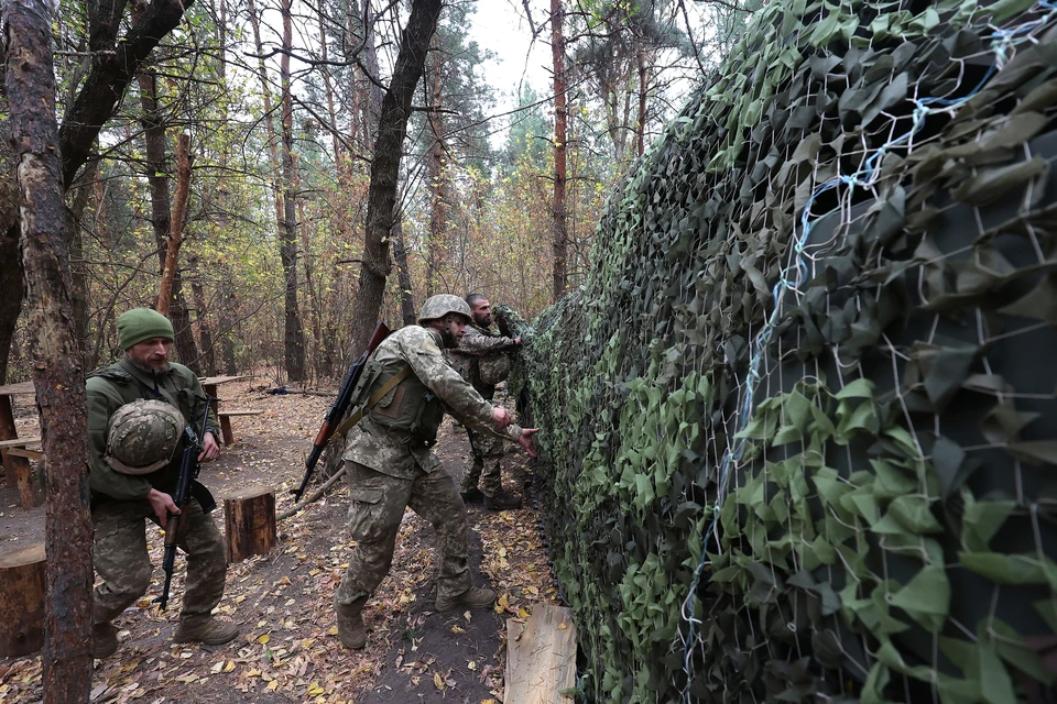 Боевики ВСУ заставляли жителей Курахово подавать им в укрытие оружие