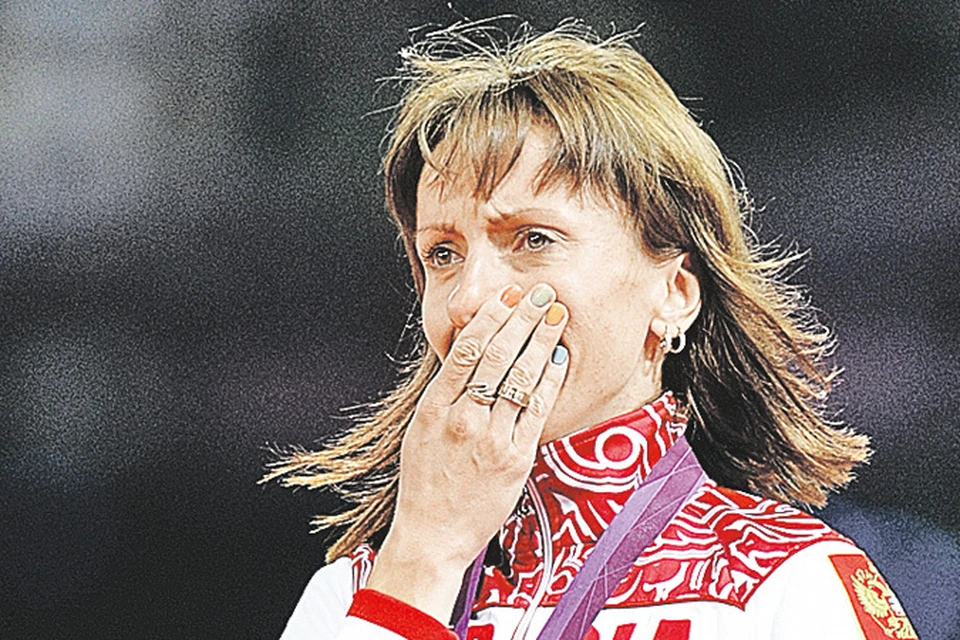 Мария Савинова на олимпийской церемонии награждения.